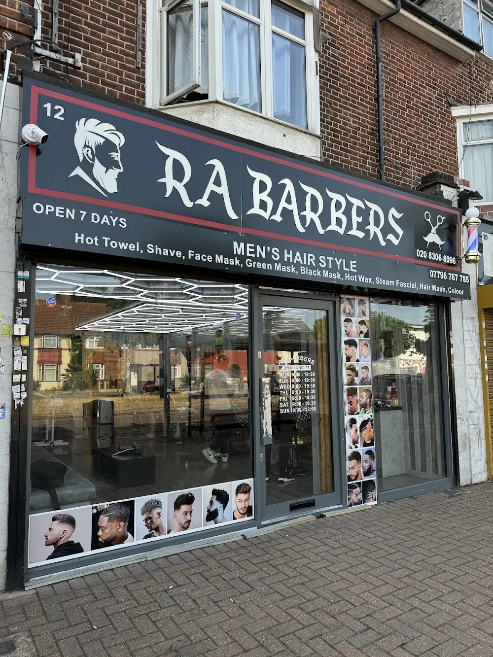 The RA Barbers shopfront and sign